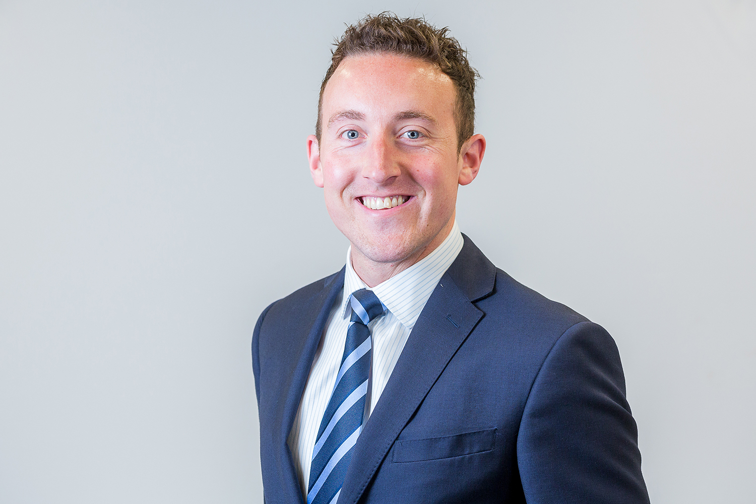 Headshot of Christian Burns-Di Lauro